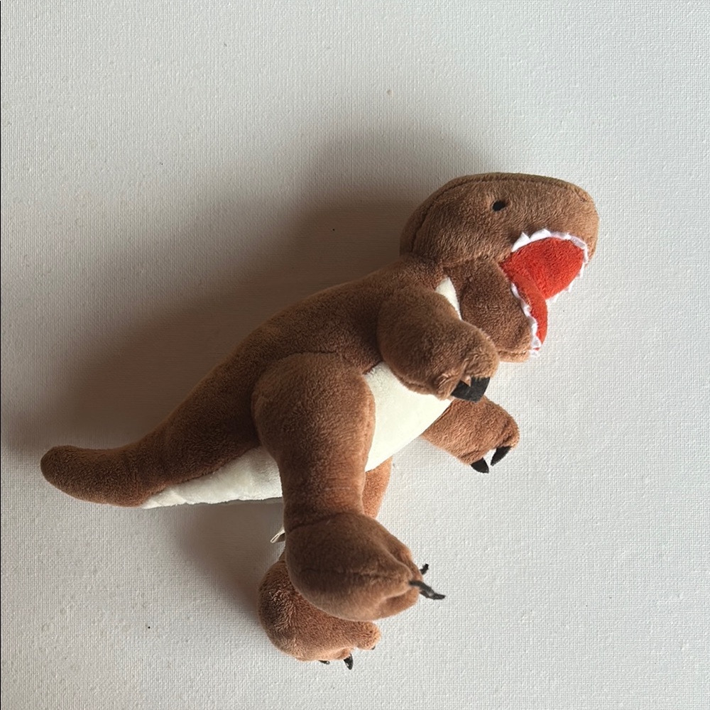 Brown Plush Dinosaur Toy with a bell inside